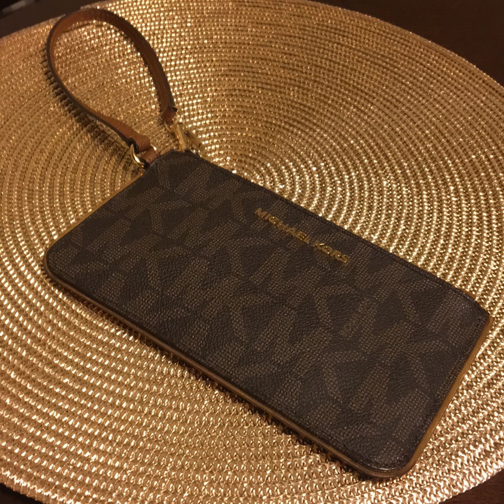 Authentic Michael Kors Wristlet Color: Brown